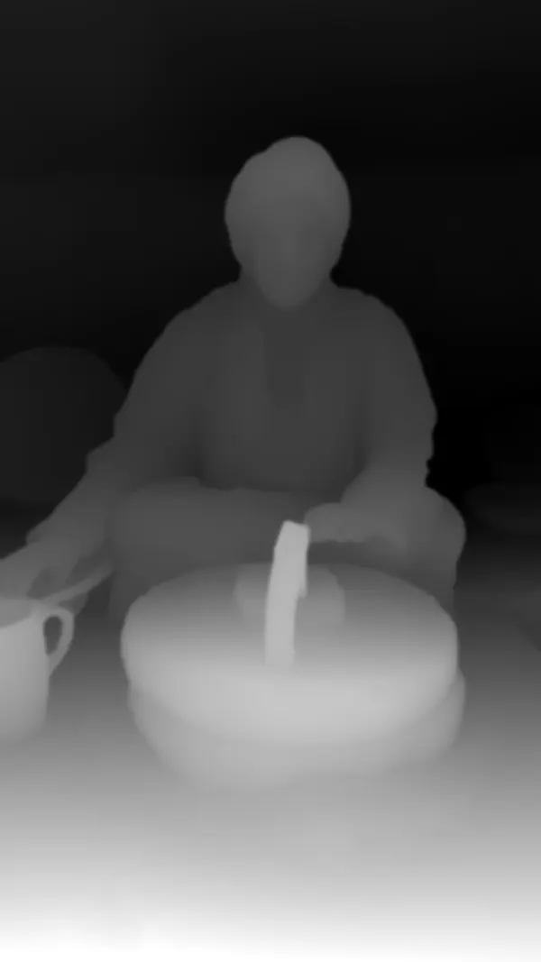 Grayscale depth map of the same frame, where nearer surfaces are lighter
